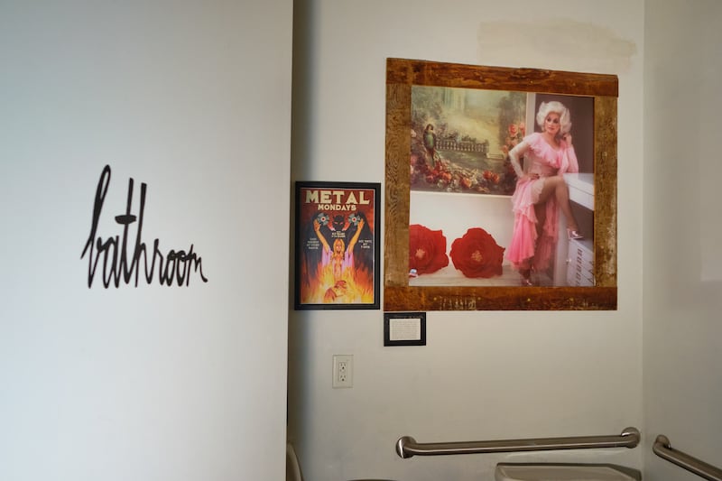 Dolly Parton Watches Over Paydirt’s Powder Room