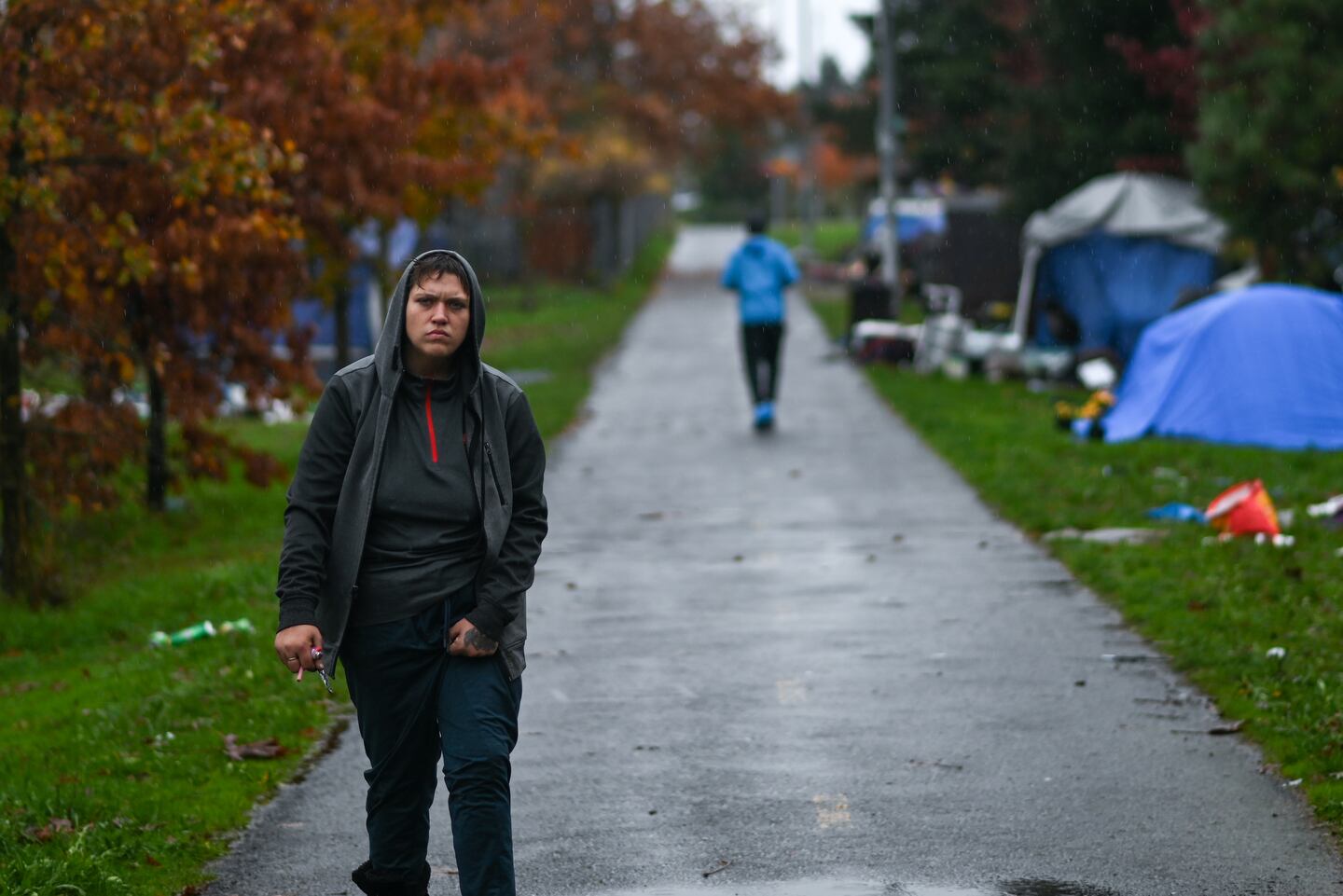 Homeless camps in rain