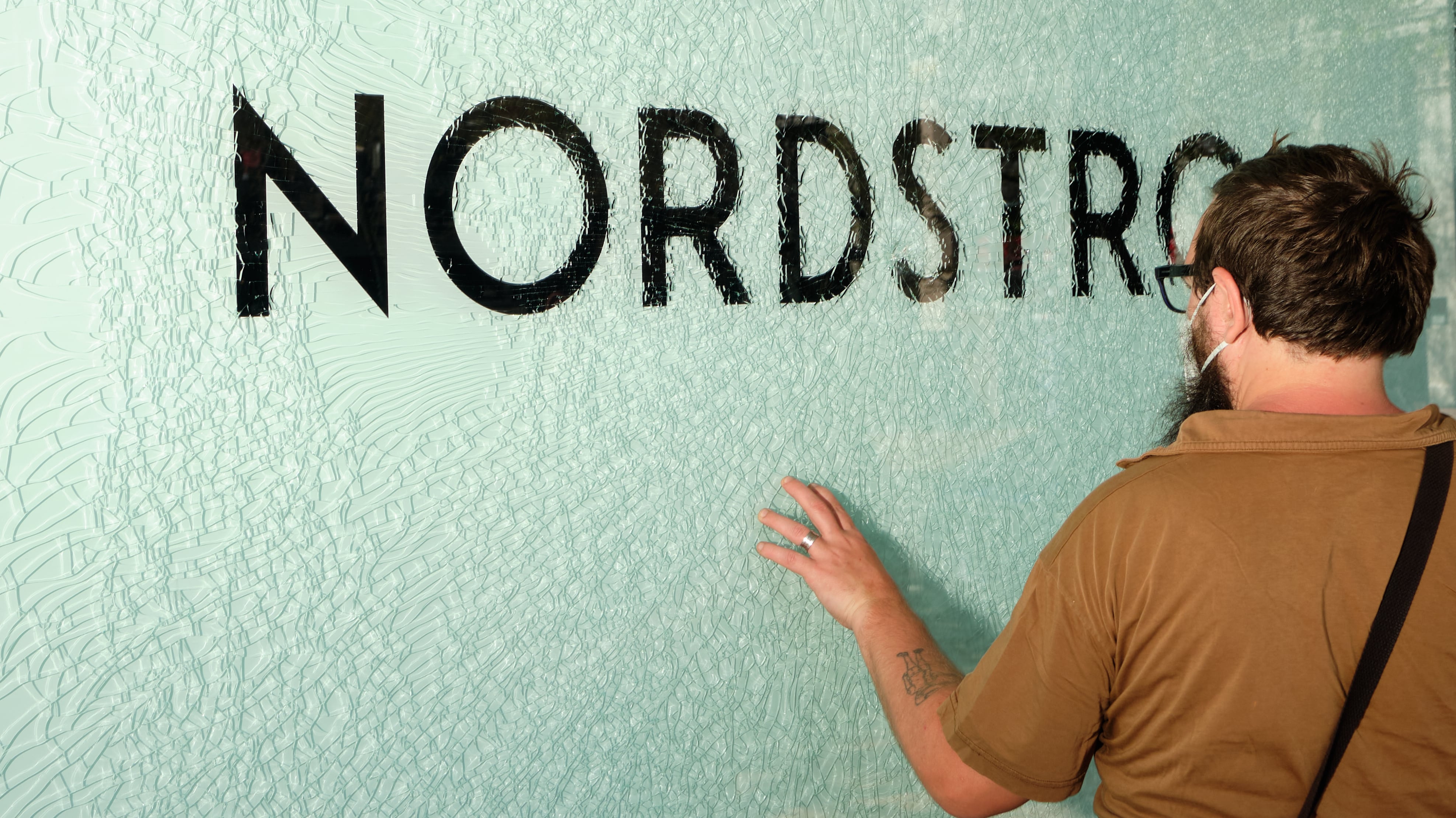 Shattered glass at a Nordstrom store.